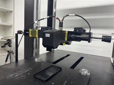 How does the intelligent vision system achieve production line flexibility?